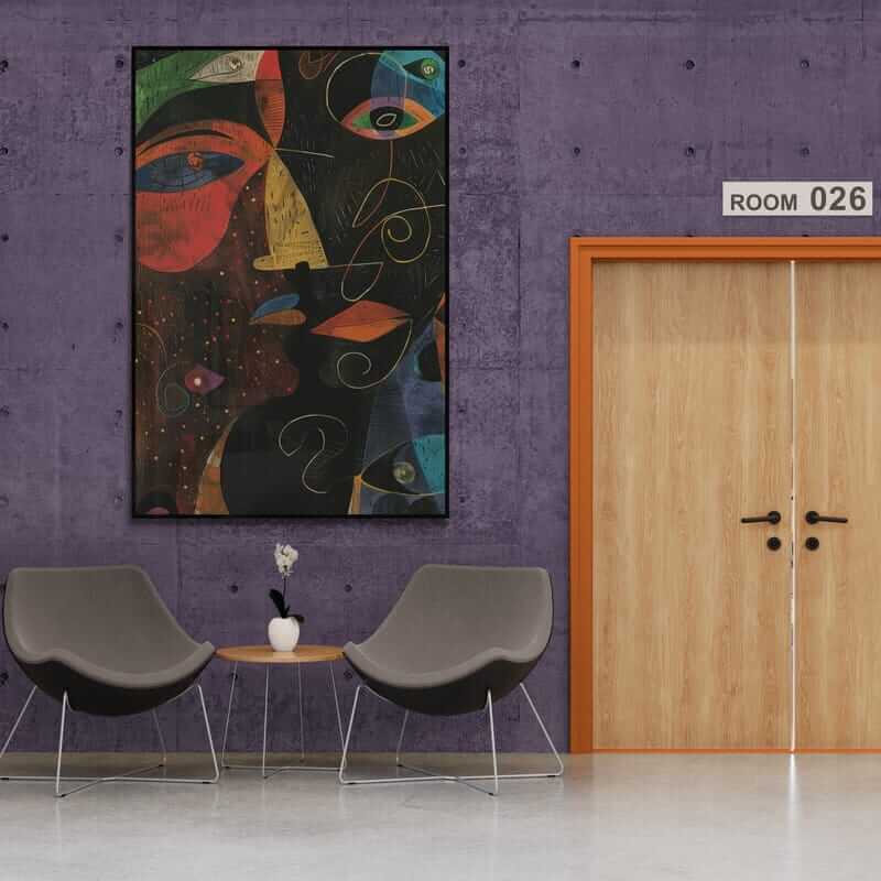 Corey Wesley abstract African-American art framed on a purple wall in a modern office seating area with two gray chairs.