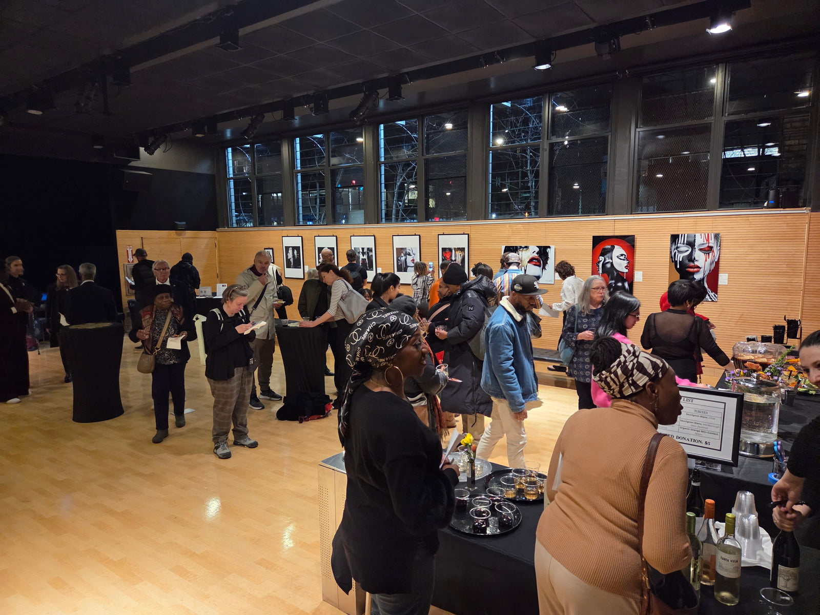 Opening night at Corey Wesley’s debut exhibition. Collectors, visitors, and community members experiencing the Unapologetic Faces series in person.