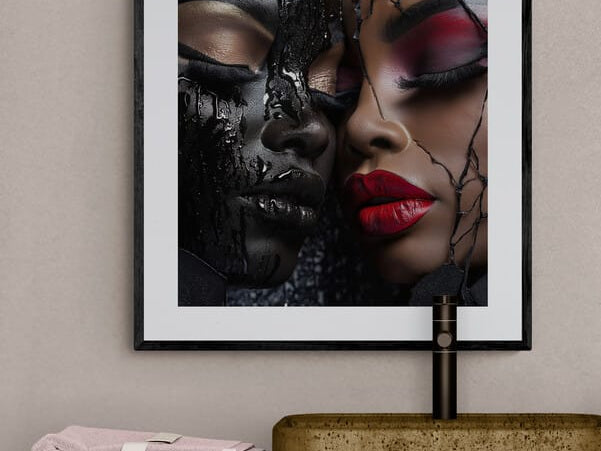 Framed modern abstract African-American art print titled "Shattered Unity" in an Afrocentric home decor setting, featuring glossy black and bright red colors