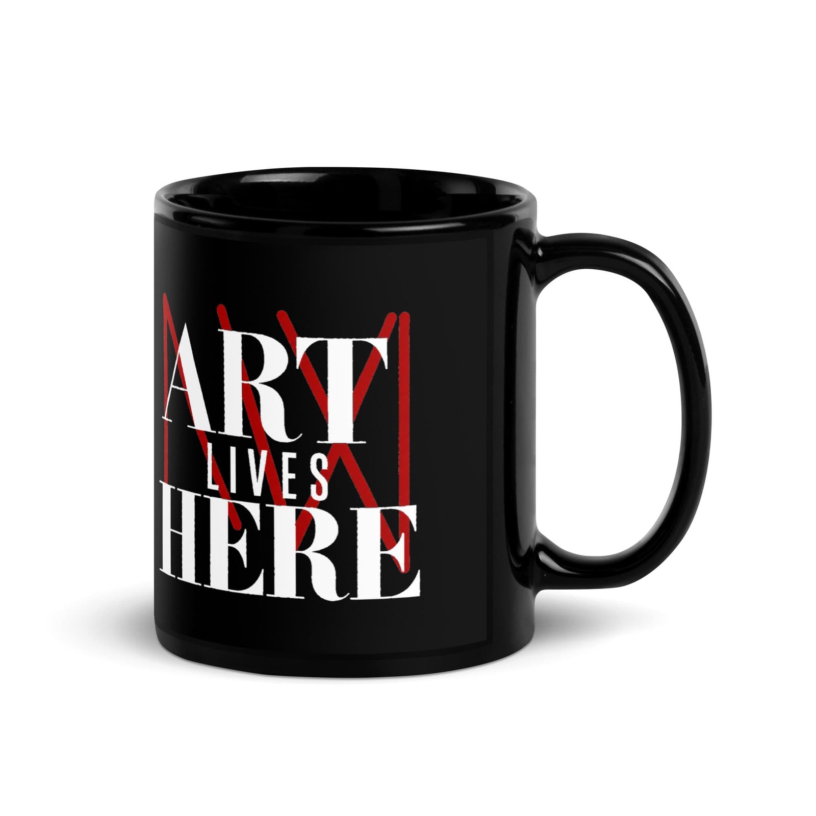 Art Lives Here Mug, black glossy 11 oz, handle on the right, with white lettering and the red MW logo.