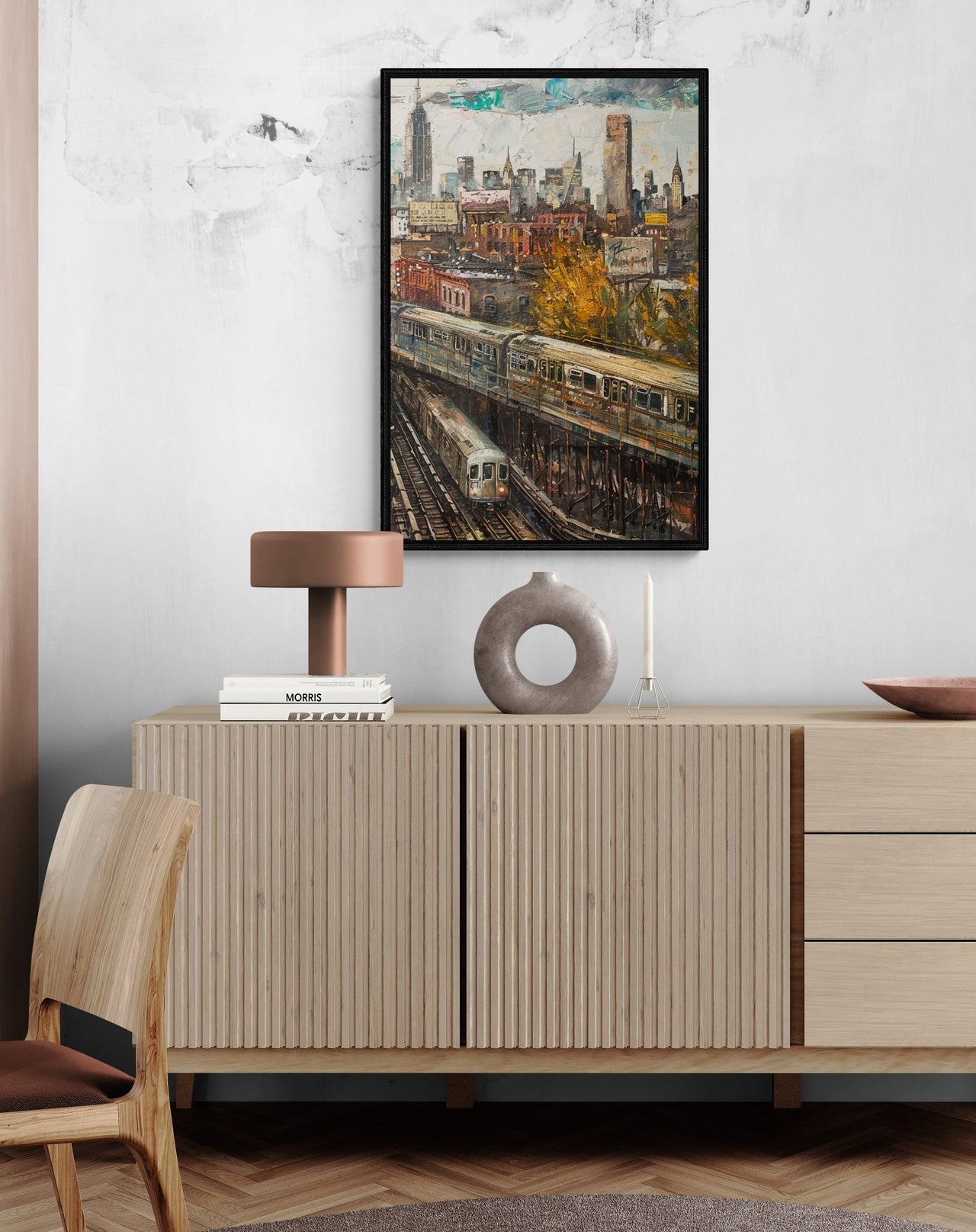 Urban landscape painting from Milton Wes Art, depicting a vibrant scene with a train crossing an overpass, set against a backdrop of historic buildings under a clear blue sky, enhancing the decor above a Scandinavian-style sideboard.