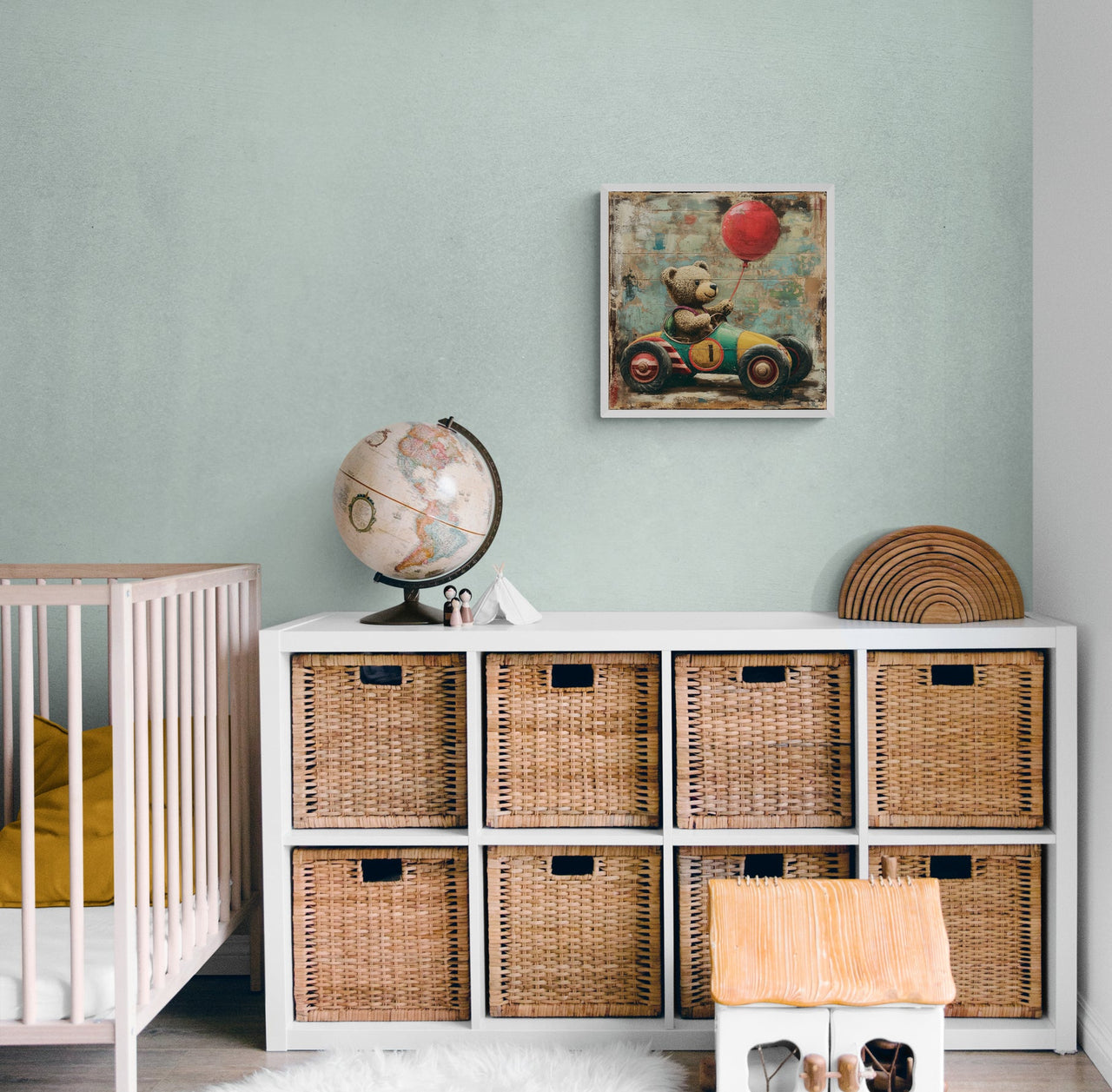 Charming nursery wall art from Milton Wes Art, featuring a teddy bear balancing a red balloon while riding a vintage toy car, creating a whimsical atmosphere in a child's room with light green walls and natural wicker storage