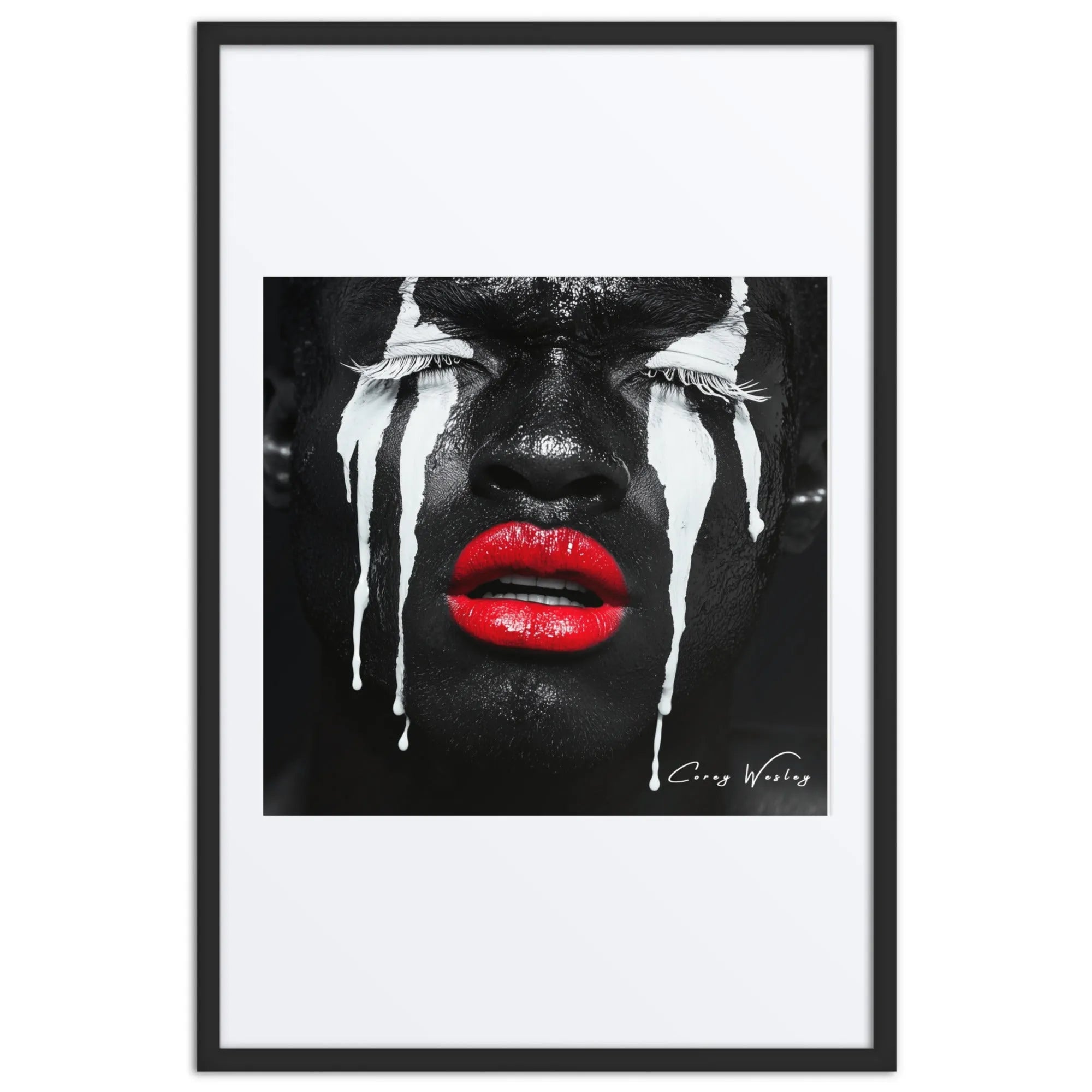 Close-up of a black and white portrait with red lips, tears, and striking expressive symbolism.