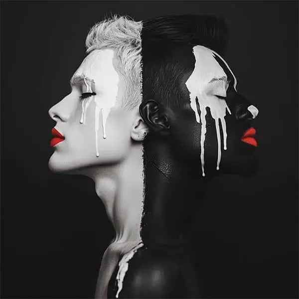 Luxury framed wall art featuring an avant-garde black and white portrait with cascading abstract paint drips and bold red lips. A statement piece designed for refined interiors and exclusive art collections