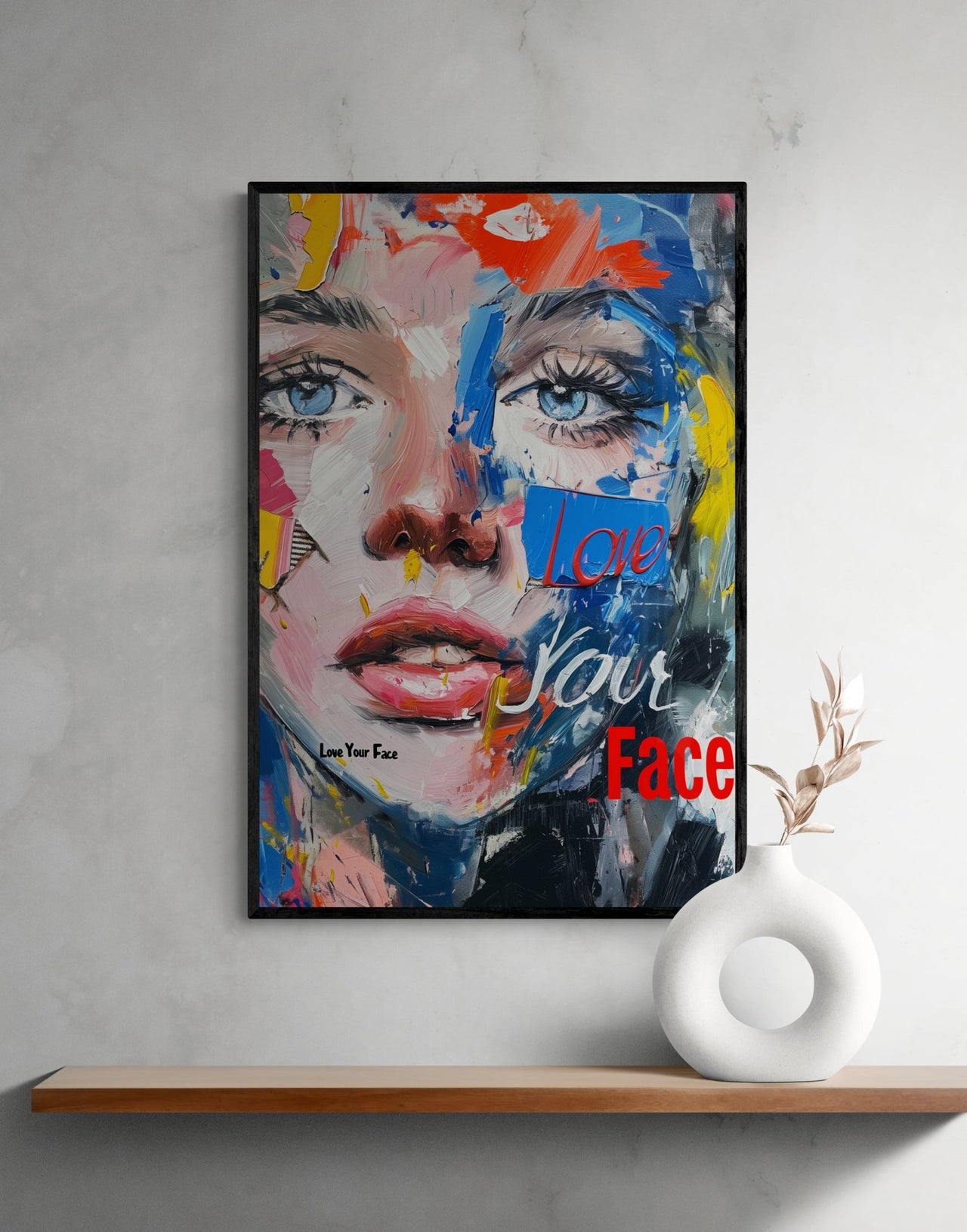 Expressive and colorful framed canvas art piece titled 'Love Your Face' with a vivid, abstract portrait from Milton Wes Art, adorning a minimalist space, available at miltonwesart.com, Harlem NYC